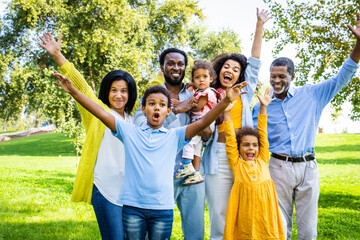 Beautiful happy african american family bonding at the park