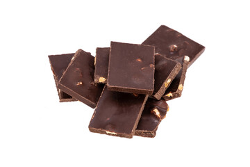 Poster - dark chocolate with nuts in a heap isolated on white background