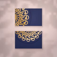 Wall Mural - Visiting business card in dark blue with Indian gold ornaments for your business.