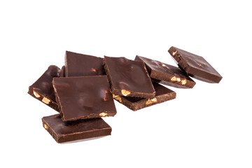 Poster - broken pieces of dark chocolate with nuts in a heap isolated on white background