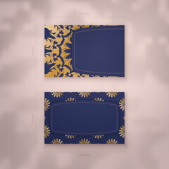 Wall Mural - Visiting business card template in dark blue color with greek gold ornaments for your contacts.