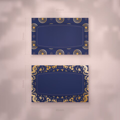 Wall Mural - Visiting business card template in dark blue color with luxurious gold pattern for your business.