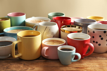 Canvas Print - Many cups of different coffees on wooden table