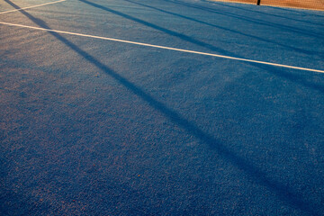 Blue paddle tennis court field with white lines background