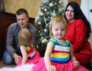 Young family with twin girls