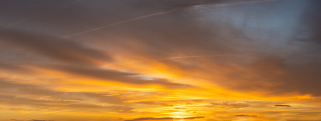 Wall Mural - fiery sunset, colorful clouds in the sky
