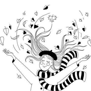 Girl throws autumn leaves over her head