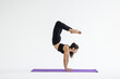 © F8  \ Suport Ukraine - young beautiful woman yoga posing over white studio background