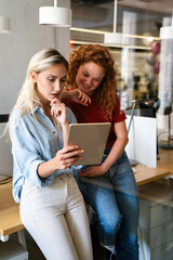 Portrait of happy young people working together and having fun in office. Business work concept