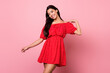 © deagreez - Portrait of attractive cheerful girl dancing posing enjoying good mood isolated over pink pastel color background