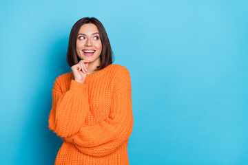 Wall Mural - Portrait of attractive funny cheerful girl making decision copy empty blank space isolated over bright blue color background