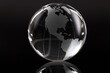 © H_Ko - Closeup of glass globe on black background