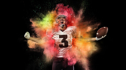 Wall Mural - Collage with young sportsman, football player shouting as winner in explosion of colored neon powder isolated on dark background