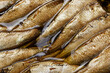 Food background vitamin A omega, fish canned smoked sprats in oil close-up top view