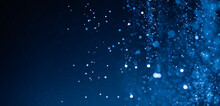 Abstract Blue Bokeh Defocus Glitter Blur Background.