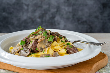 Canvas Print - Venison meatballs with creamy mushroom sauce and pappardelle pasta