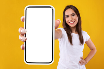 Aufkleber - Woman showing white empty smartphone screen close up to camera