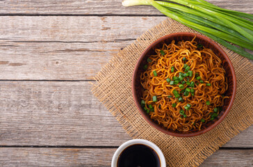 Canvas Print - Fried Instant noodles with  green onion and soy sauce