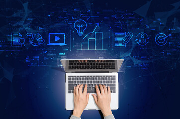Wall Mural - Content marketing concept with person using a laptop computer