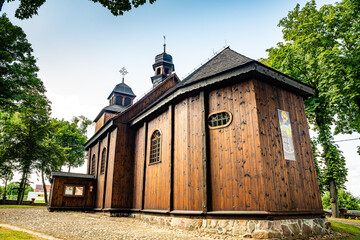 Lubowo, Poland - August 09, 2021. Old wooden st. Mikolaj Church - Kosciol pw. sw. Mikolaja