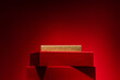 Majestic red podium made of gift boxes Red background ..