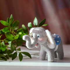 Wall Mural - Cute woolly toy elephant, felting wool