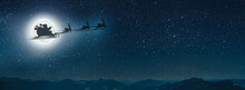 Silhouette Of A Flying Goth Santa Claus Against The Background Of The Christmas Night Sky.