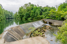Small Hydroelectric Power Plant In The River, France. Operating Since The 60s. High Quality Photo