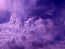 Fantastic Purple Clouds In The Heaven. Night Fantasy Cloudy Sky. Incredible Evening Cloudscape. Mysterious Dusk.