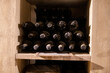 Bottles of vintage fortified ruby or tawny porto wine in old cellars of Vila Nova de Gaia, Portugal
