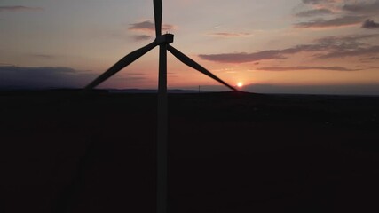 Canvas Print - Windmill silhouette at sunset sky. Wind turbine generator. Wind energy concept. Suistanable and renewable energy for climate protection