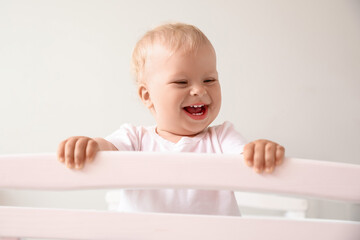 Sticker - Adorable little baby in crib