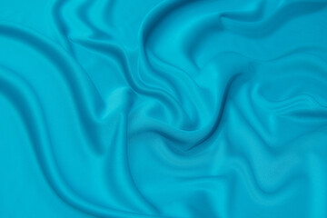 Wall Mural - Close-up texture of natural blue fabric or cloth in tidewater color. Fabric texture of natural cotton or linen textile material. Blue or green canvas background.