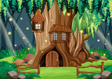 Fototapeta Pokój dzieciecy - Fantasy forest scene with hollow tree house