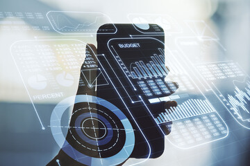 Poster - Double exposure of abstract creative statistics data hologram and hand with cell phone on background, statistics and analytics concept