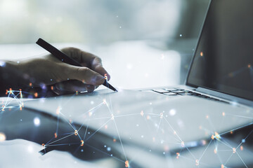 Poster - Creative concept of wireless technology and hand writing in notebook on background with laptop. Big data and database concept. Multiexposure