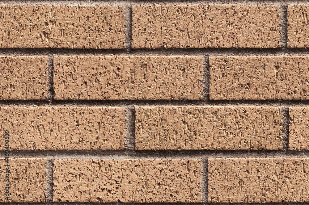 Repeating sandy brick wall texture typically found in developed areas ...