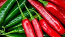 Group Of Both Red And Green Freshly Picked Ripe Chili Peppers. Red Chilies Contain Large Amounts Of Vitamin C And Small Amounts Of Carotene (provitamin A).