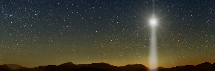 Wall Mural - the star shines over the manger of christmas of jesus christ.