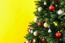 Composition With Christmas Tree On Yellow Background