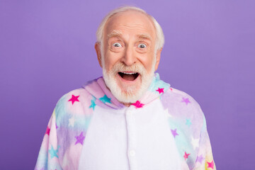 Sticker - Photo of funny impressed man pensioner unicorn sleepwear open mouth smiling isolated violet color background