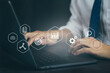 © kelvn - Businessman working remotely at office, modern interface payments online shopping and icon customer network connection.
