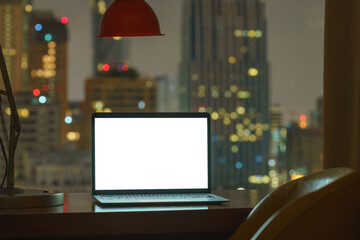 Aufkleber - laptop computer on table white display see through city on night