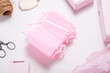 canvas print picture - Lot of pink organza gift boxes on wooden desk