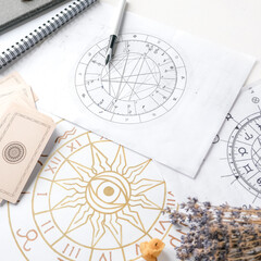 Astrology. Astrologer calculates natal chart and makes a forecast of fate.Tarot cards, Fortune telling on tarot cards magic crystal, occultism, Esoteric background. Fortune telling,tarot predictions.