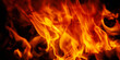 © zwiebackesser - Fire background as symbol of hell and eternal pain. Free copy space for design. Vertical image.
