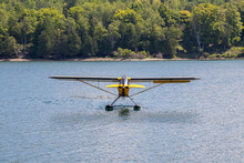 Seaplane Taxing In The Water At Gore Bay In Ontario, Canada