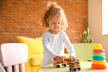 Sticker - Cute baby girl playing at home