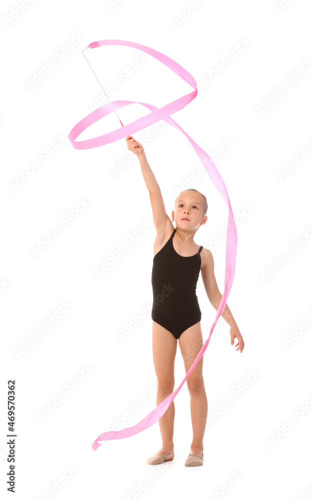Little girl doing gymnastics with ribbon on white background
