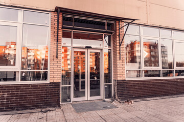 Replacement of double-glazed windows in shop windows, reconstruction of the supermarket facade, repair of windows